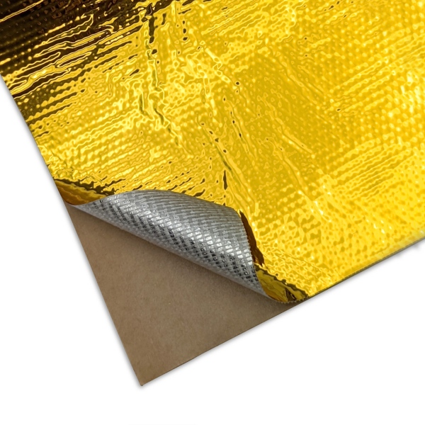 Adhesive backed gold heat reflective sheet supplied in sheet/roll format for peel-and-stick radiant heat shielding.